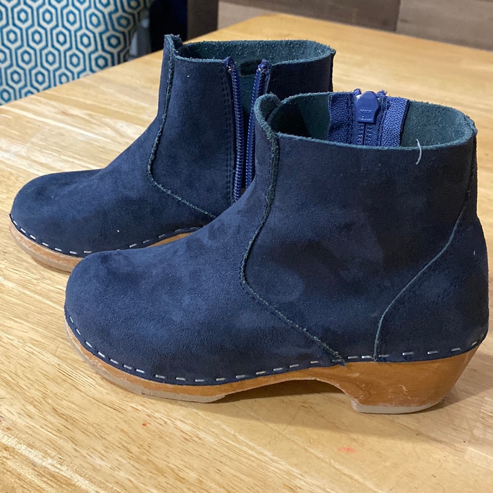Beautiful blue suede booties with wood heels.